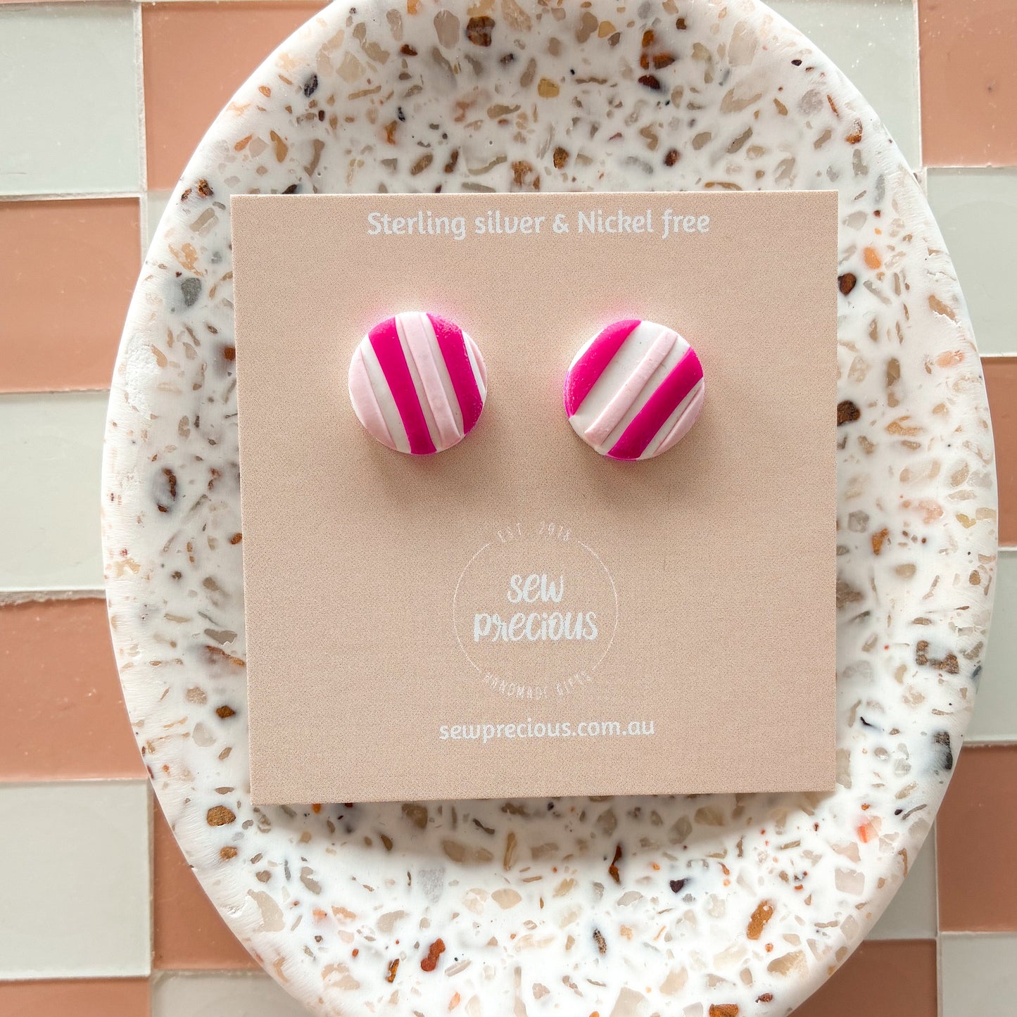 Magenta stripe studs
