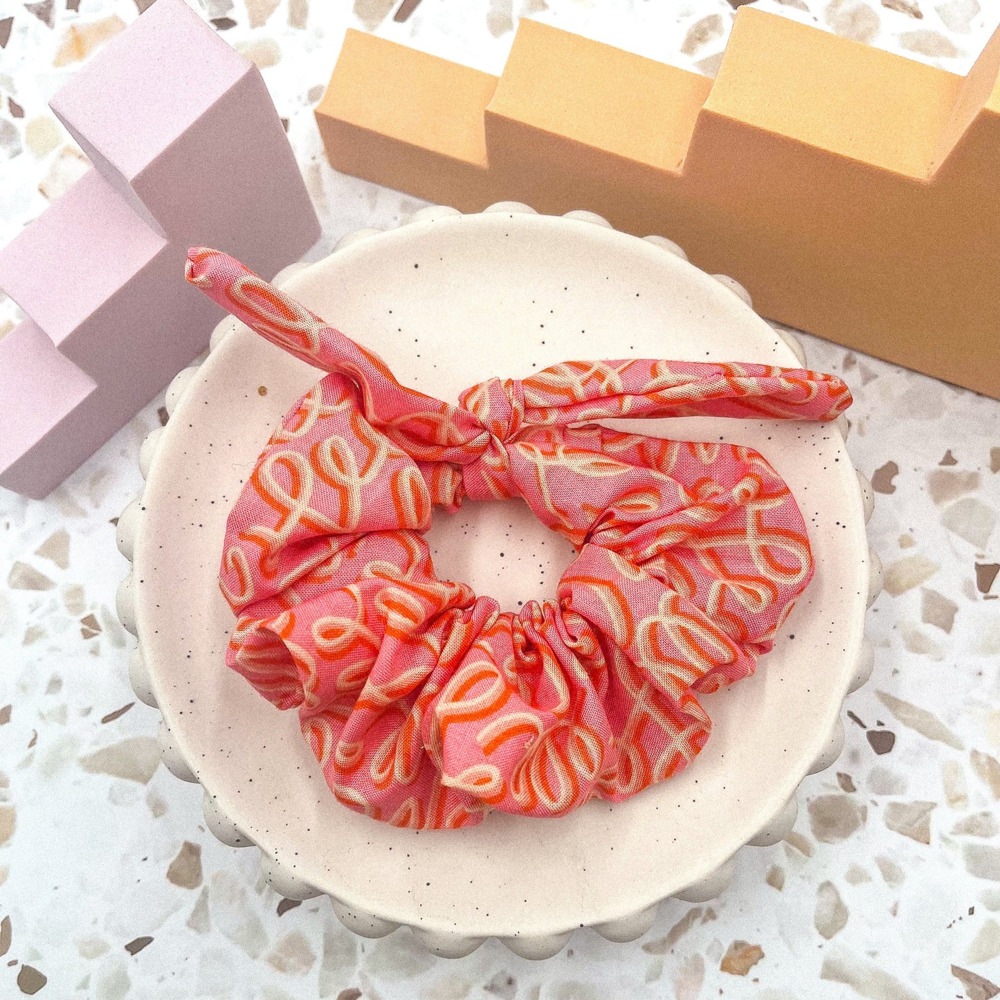 Pink/orange squiggle scrunchie bow