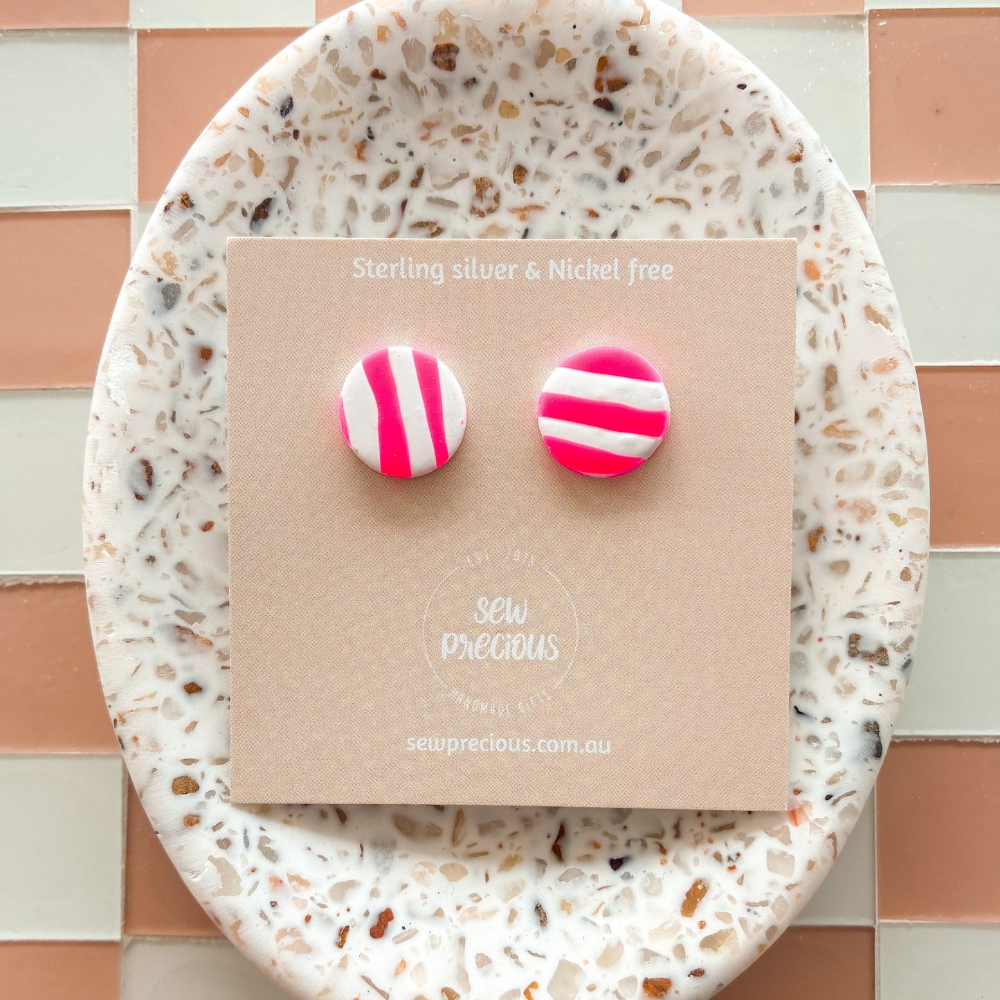 Fluro Pink stripe studs