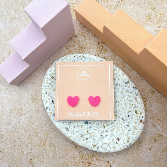 Fluro pink heart studs