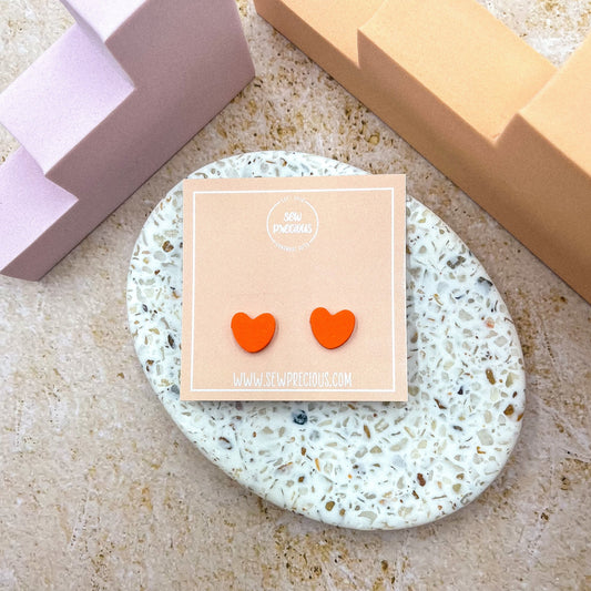 Orange heart studs