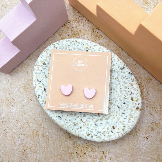 Pretty pink heart studs