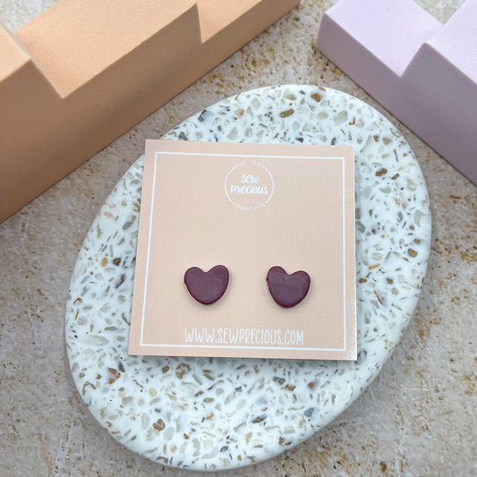 Burgundy heart studs